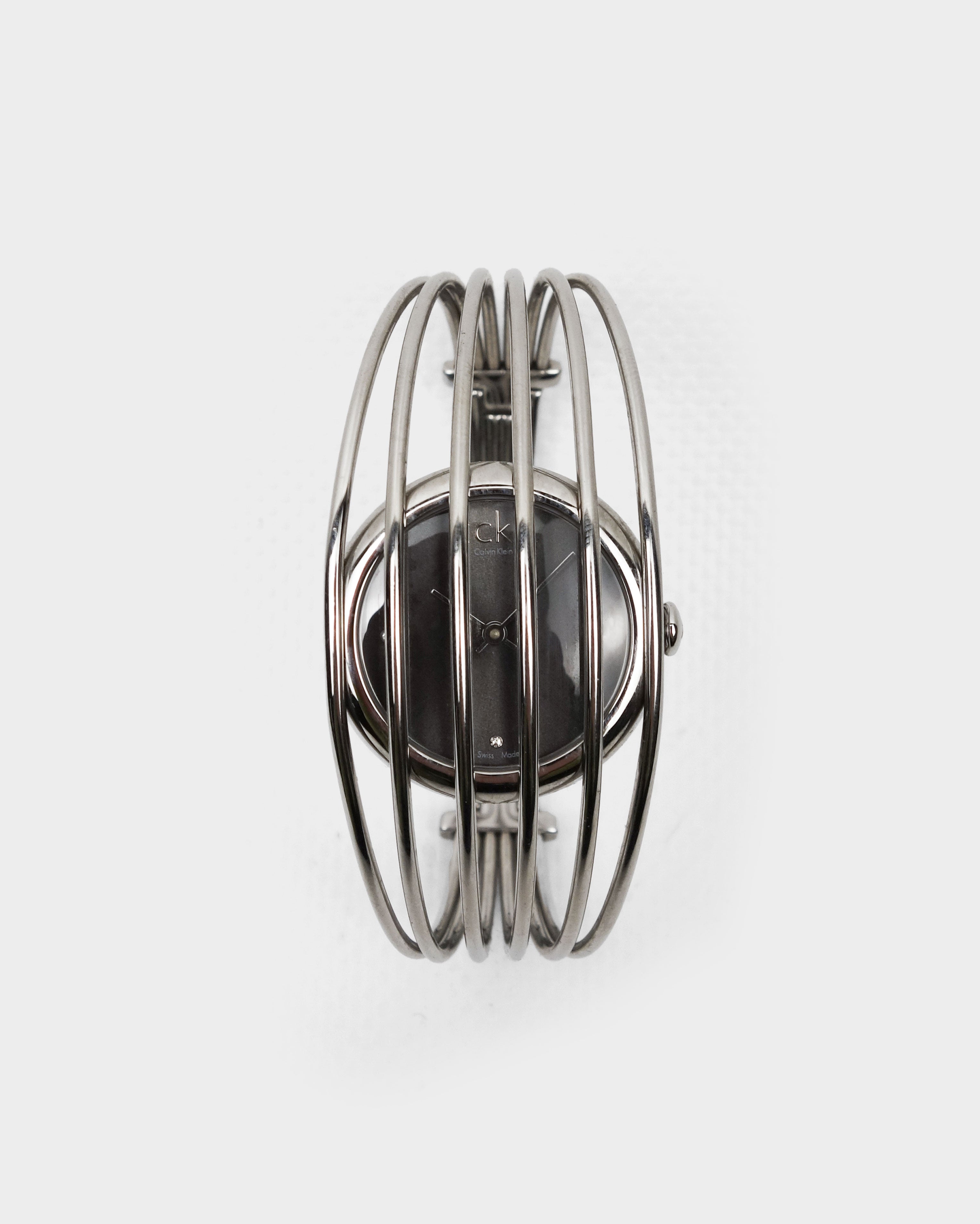 Calvin Klein “Cage” Wire Cuff Metallic Watch 2000's - Vintagetts