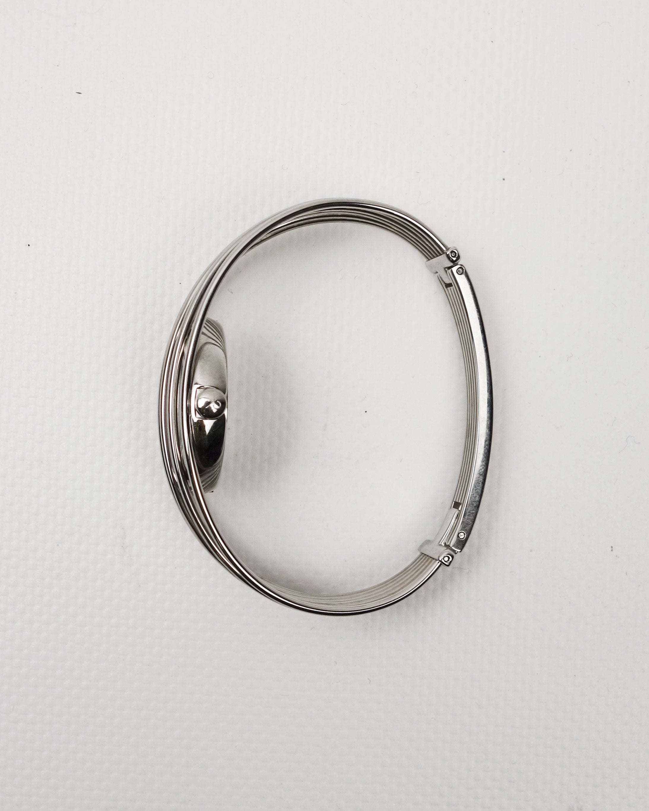 Calvin Klein “Cage” Wire Cuff Metallic Watch 2000's - Vintagetts
