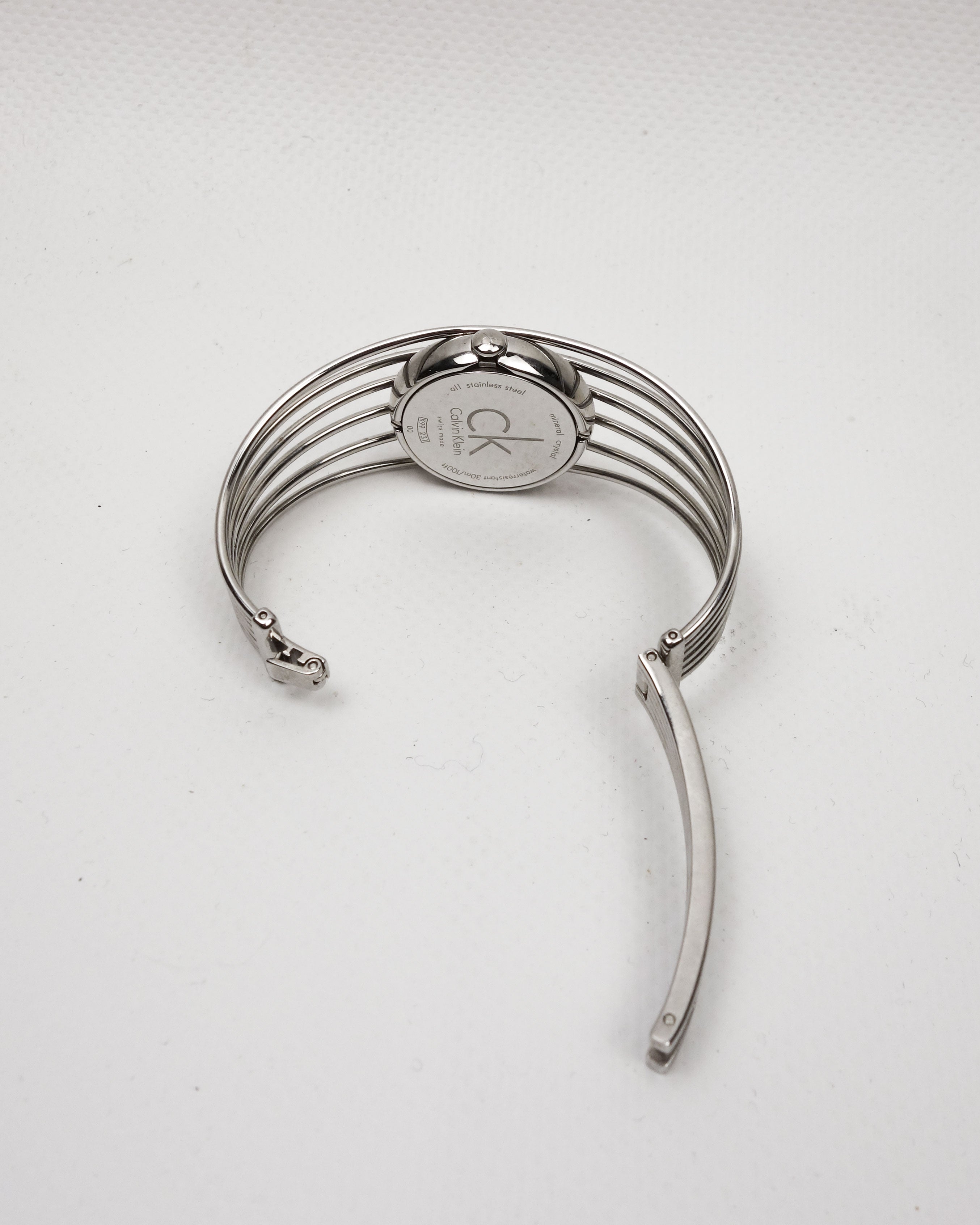 Calvin Klein “Cage” Wire Cuff Metallic Watch 2000's - Vintagetts