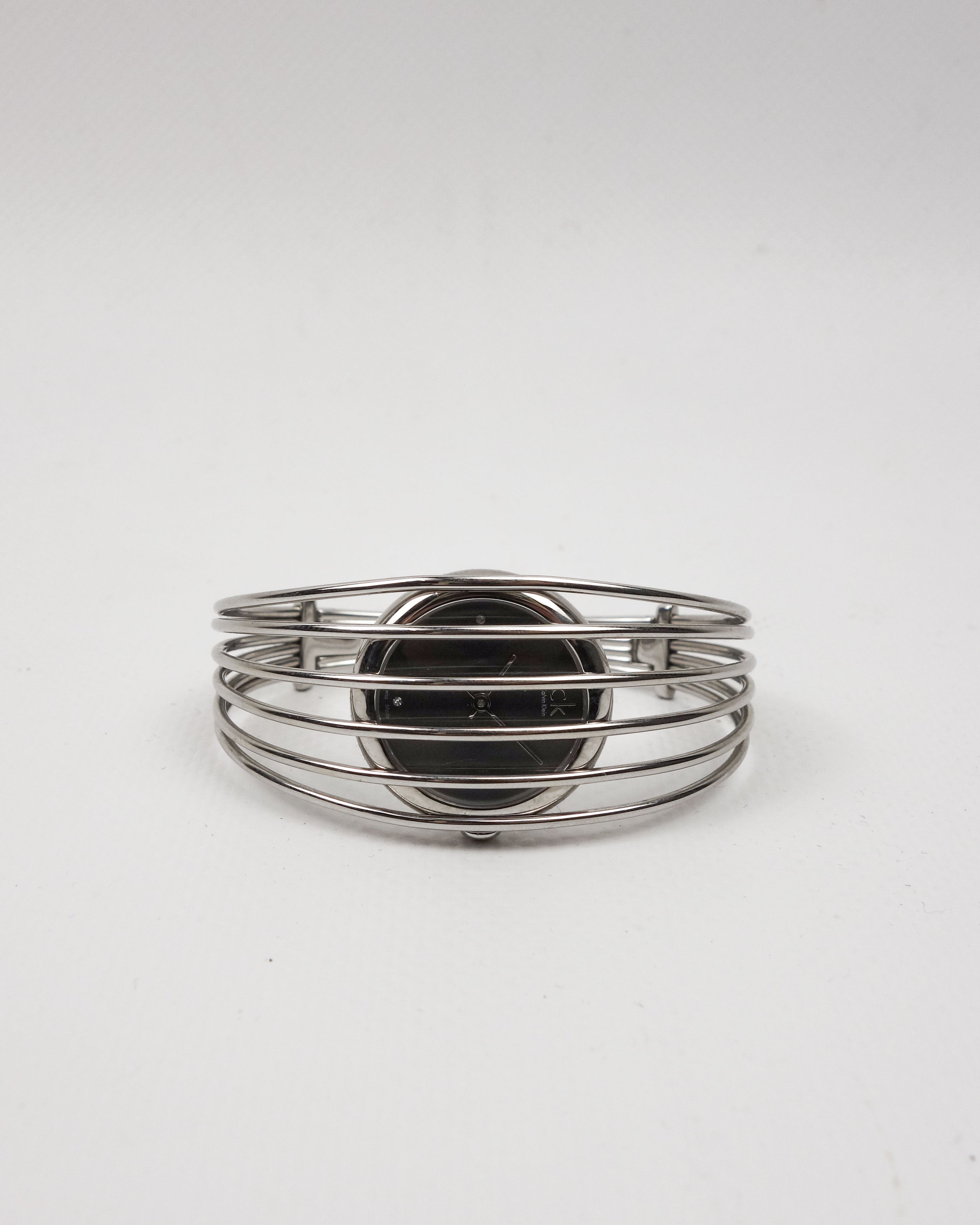Calvin Klein “Cage” Wire Cuff Metallic Watch 2000's - Vintagetts